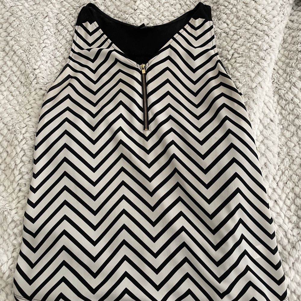 Express Black and White Chevron Zip-Front Sleeveless top